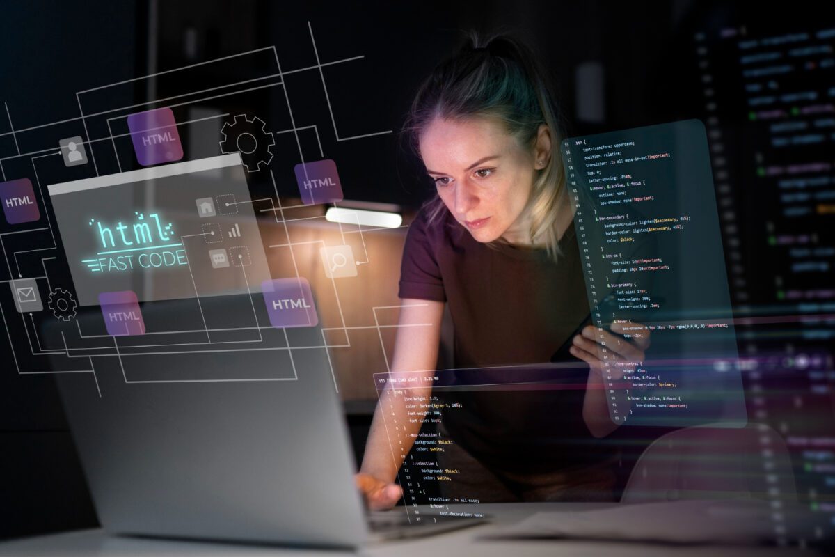 medium shot woman working laptop